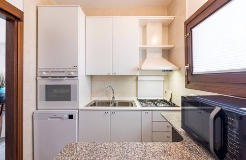 Santa Reparata House | Holiday Home 'Villetta Fronte Mare A S. Reparata' with Sea View, Wi-Fi and Air Conditioning