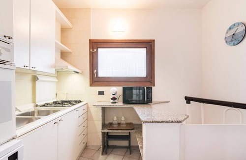 Santa Reparata House | Holiday Home 'Villetta Fronte Mare A S. Reparata' with Sea View, Wi-Fi and Air Conditioning