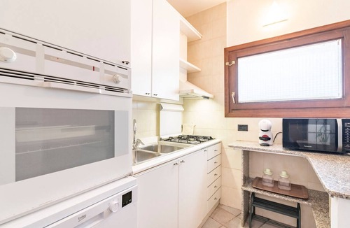Santa Reparata House | Holiday Home 'Villetta Fronte Mare A S. Reparata' with Sea View, Wi-Fi and Air Conditioning