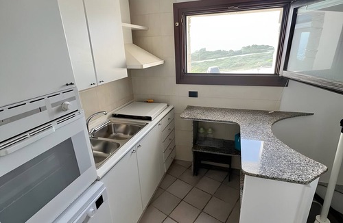 Santa Reparata House | Holiday Home 'Villetta Fronte Mare A S. Reparata' with Sea View, Wi-Fi and Air Conditioning