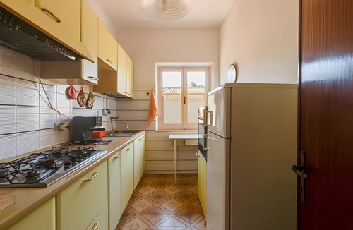 Capo Mannu House | Holiday Home 'Villa Sa Mora' with Sea View, Shared Garden and Air Conditioning