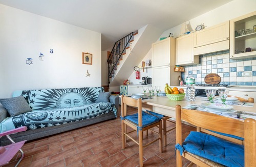 Calasetta House | Holiday Home 'Villetta Gelsomino' with Sea View, Garden & Terrace