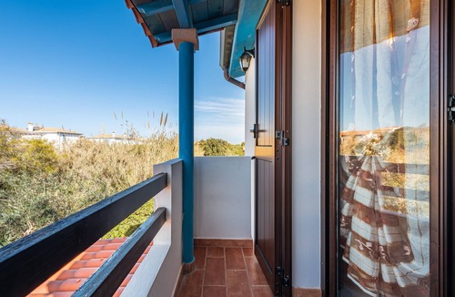 Calasetta House | Holiday Home 'Villetta Gelsomino' with Sea View, Garden & Terrace