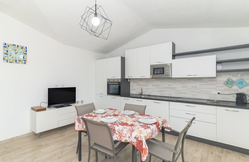 Budoni House | Holiday Home 'Virgi Sea View' with Sea View, Private Terrace and Air Conditioning