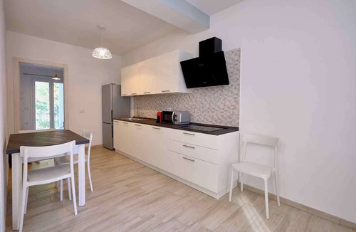 Iglesias Historic Centre Apartment | Iglesias apartments with AC, kitchen, and parking. Great for holidays.