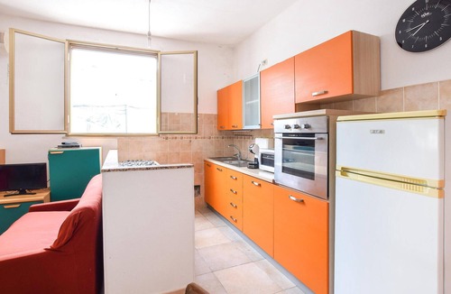 Cala Liberotto House | In the small seaside resort of Cala Liberotto, this practical vacation home welcomes you.