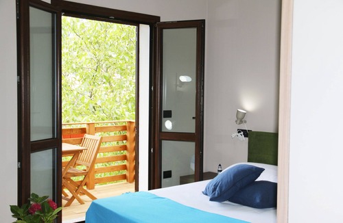 Aritzo Condo | Independent chestnut apartment in holiday home with garden and barbeque