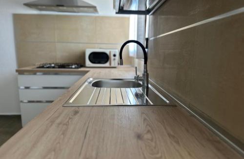 San Giovanni Apartment | La Caletta Comfort - Wi-Fi, AC, parcheggio
