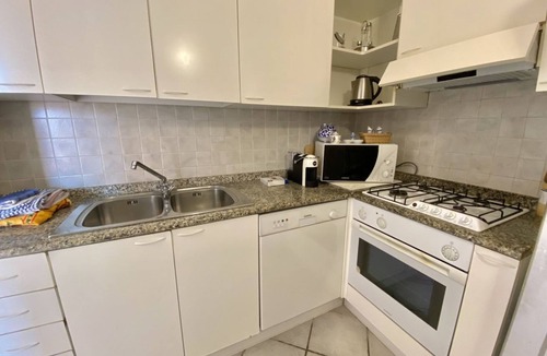 Baia Caddinas Apartment | Located in the side area of the residence, Elicriso is a one-bedroom apartment of approximately 55 sqm on the first floor, featuring a stunning sea view and a spacious panoramic terrace of 14 sqm. The terrace is furnished with a grani