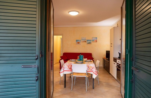 Tortoreto Lido Apartment | Lovely apartment for 4 guests with A/C, WIFI, pool, TV, patio and pets allowed