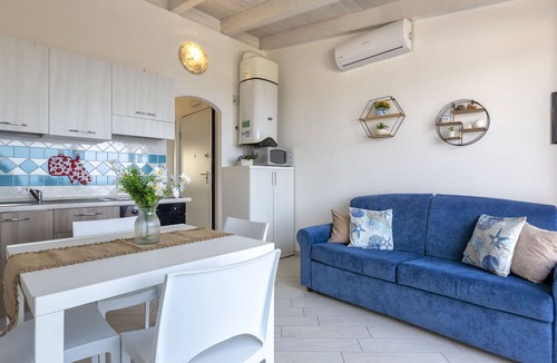 Paduledda Apartment | Lovely apartment for 4 guests with A/C, pool, TV, terrace and pets allowed
