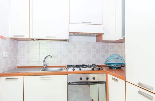 Telti Apartment | Lovely apartment for 6 guests with WIFI, pool, TV, patio and pets allowed