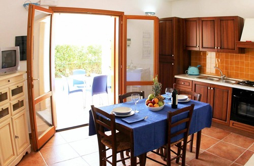 S'Iscala Apartment | Nice apartment for 4 people with A/C, pool, WIFI, TV, terrace and pets allowed
