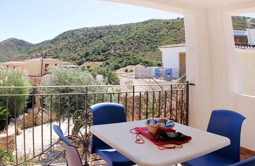 S'Iscala Apartment | Nice apartment for 4 people with A/C, pool, WIFI, TV, terrace and pets allowed