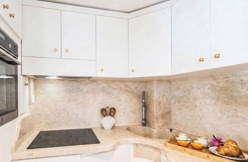Punta Sardegna Apartment | Nice apartment for 5 guests with WIFI, A/C, TV, patio and pets allowed