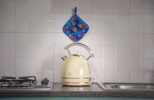 Giugliano in Campania Apartment | Petito House - Cozy apartment surrounded by greenery.