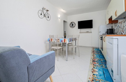 Rudalza Apartment | Porto Rotondo Garden Apartment with Mountain View, Wi-Fi, and Air Conditioning