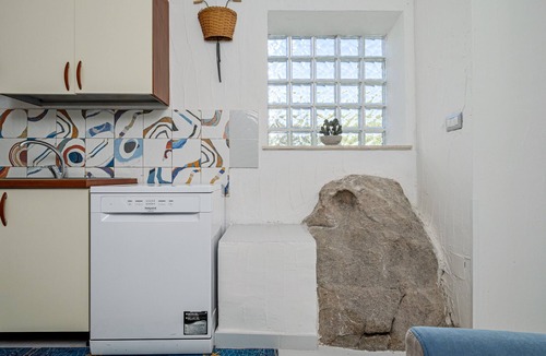 Rudalza Apartment | Porto Rotondo Garden Apartment with Mountain View, Wi-Fi, and Air Conditioning