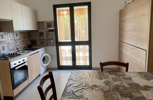 San Giovanni Apartment | Private Garden & BBQ | Relaxation in La Caletta for 4