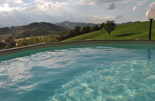 Acqualagna House | Private house with private pool and a large fenced garden. Pet friendly