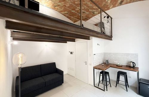 Calangianus Apartment | Quadruple Room with Balcony Overlooking the Main Street and Square, Air Conditioning