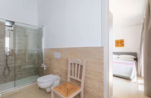 Lotzorai House | Room Grazia Deledda - I Centenari Longevity Rooms