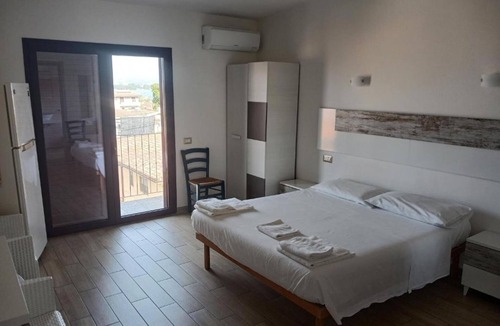 Girasole House | Room 'Junior Suite Marisa' with Balcony, Wi-Fi and Air Conditioning