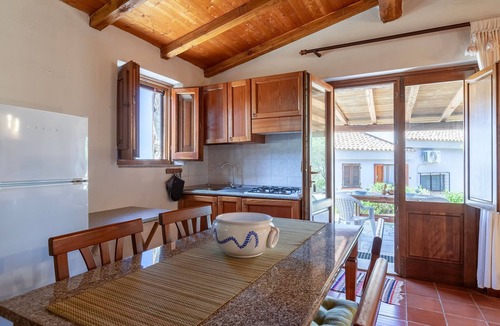 Paduledda Apartment | 'Rustico' Apartment with Sea View, Private Terrace and Air Conditioning