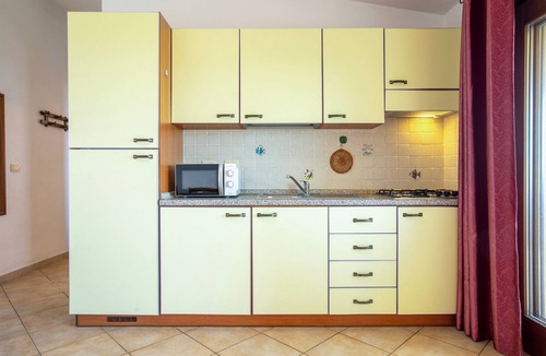 Paduledda House | Sea View Isola Rossa Apartment with Sea View, Wi-Fi, and Air Conditioning