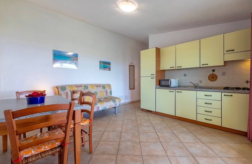 Paduledda House | Sea View Isola Rossa Apartment with Sea View, Wi-Fi, and Air Conditioning