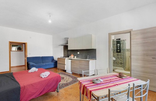 Orgosolo Apartment | Studio '3' with Shared Terrace, Wi-Fi and Air Conditioning