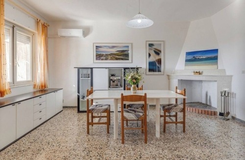 Tresnuraghes Apartment | Terrace at Sunset: Relaxation and a Breathtaking View.