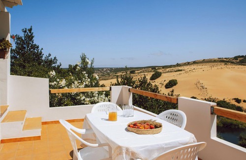Torre dei Corsari Ski Chalet | The Terrace on the dune 6 by Propertize