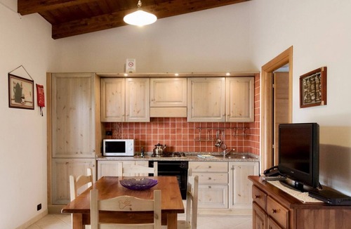 Santa Maria La Palma Apartment | This elegant 40 sq m one bedroom apartment for two people, at ground floor.Comprises a living room with little kitchen, a double bedroom and bathroom with shower.A lovely private outdoor space, furnished with a table and chairs, offers a relaxing spot in