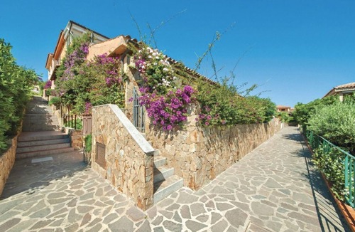 Golfo di Marinella Apartment | Three-room apartment of approximately 50 square meters, 300 meters from the sea and with older furnishings.It comprises a living room with a fully equipped kitchenette, a sofa bed, a double bedroom, a second bedroom with two single beds, and a bathroom w