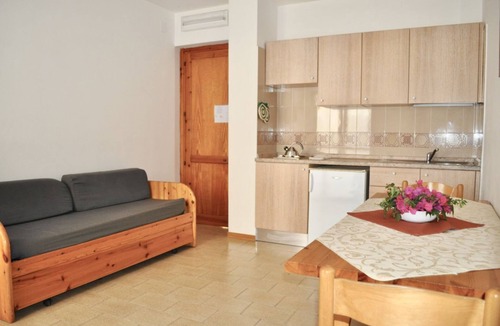 Lido Apartment | Three-room apartment of approximately 43 m2 composed of a living room, kitchenette with fridge, microwave and electric hobs, double sofa bed and balcony equipped with table and chairs.Two double or twin bedrooms, bathroom with shower.Endowed of:- Air con