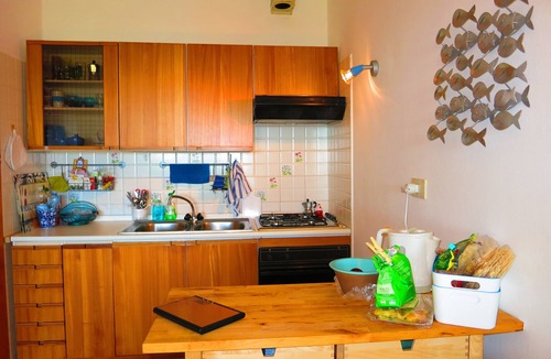 San Teodoro Apartment | Three-room garden apartment with sea view, 200m from Salina Bamba and 800m from Cala Brandinchi