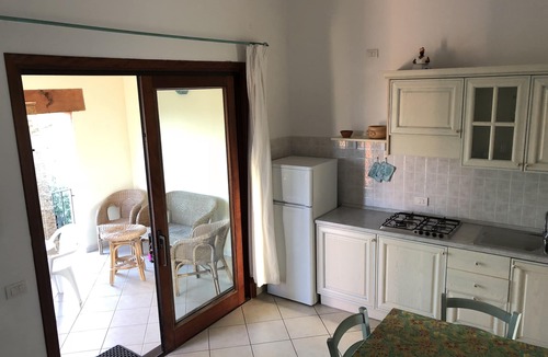 Luddui Apartment | Two-room apartment surrounded by olive trees with swimming pool and sea view