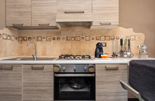 Budoni House | Vacation Home "Casa a Schiera Budoni" with Terrace & Garden