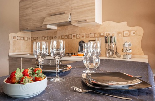 Budoni House | Vacation Home "Casa a Schiera Budoni" with Terrace & Garden