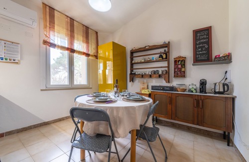 Quartu Sant'Elena House | Vacation Home 'Luxi Noa Upper House' with Shared Terrace, Wi-Fi & Air Conditioning