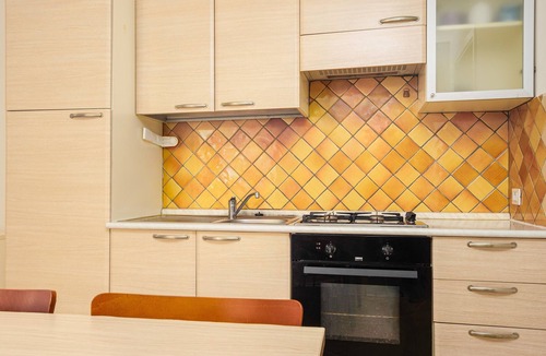 Baia Caddinas House | Vacation Home "Residence Orizzonti App N 3" with Private Terrace & A/C