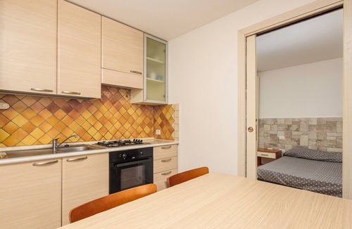 Baia Caddinas House | Vacation Home "Residence Orizzonti App N 3" with Private Terrace & A/C