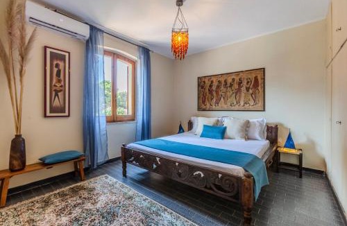 Porto Pino Villa | Villa Etnic Eloise a walk from Porto Pino beach