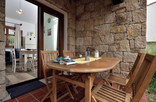 Lotzorai Apartment | Villa Menhir. Mediterranean garden. Mountain view.