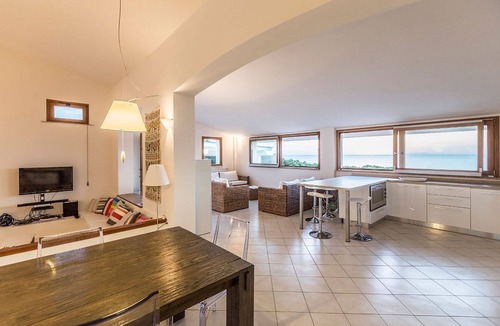 Li Junchi Villa | Villa Napius - private beach access on a sandy beach
