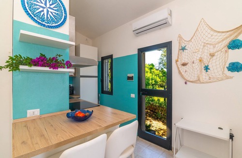 San Teodoro Villa | Villa 'Vista Mare Cala Ginepro' with Sea View, Private Terrace and Air Conditioning