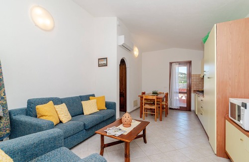 Monte Petrosu Apartment | Villetta Girasole: apartment with private terrace, garden and air conditioning