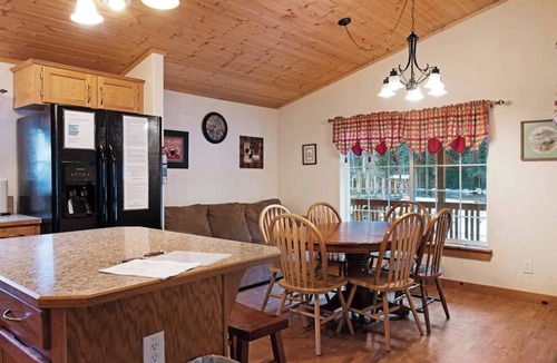 South Fork Cabin | Waterfront cabin with mountain view, wood stove, private hot tub, & WiFi