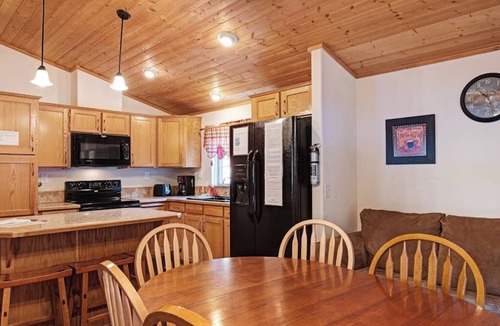 South Fork Cabin | Waterfront cabin with mountain view, wood stove, private hot tub, & WiFi